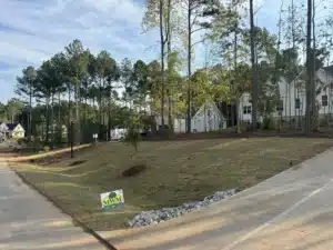Front yard of new construction home in Franklinton, NC with freshly installed Bermuda sod by MWM Landscaping & Grading.