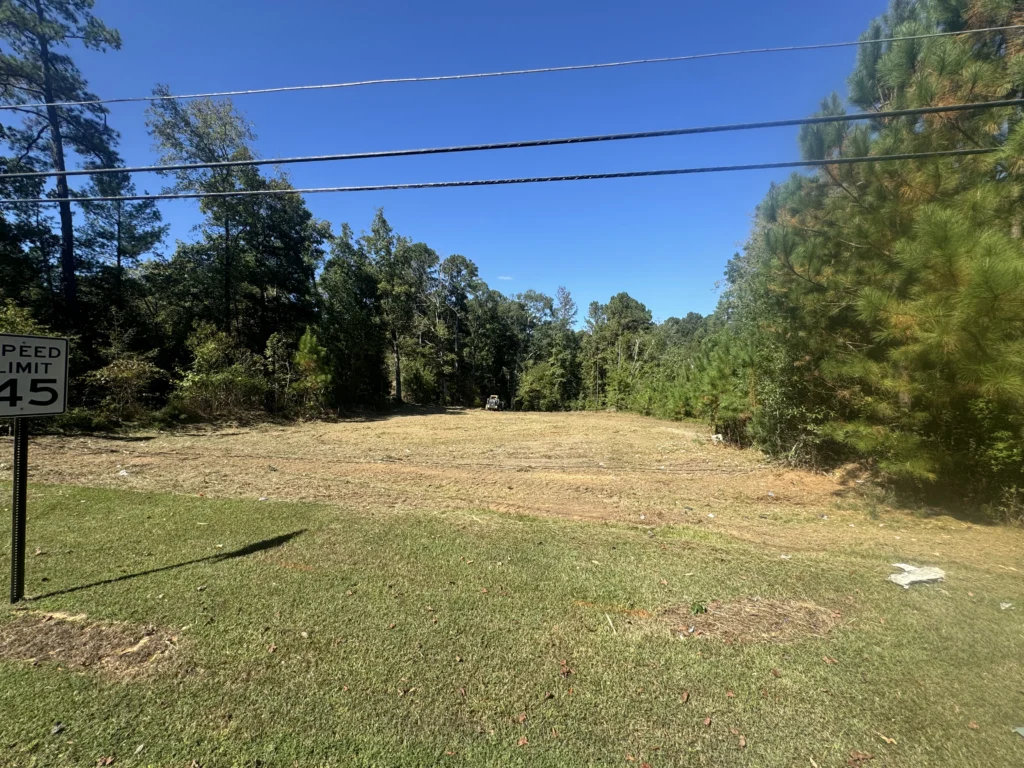Durham NC land clearing transformation after forestry mulching with all brush removed.